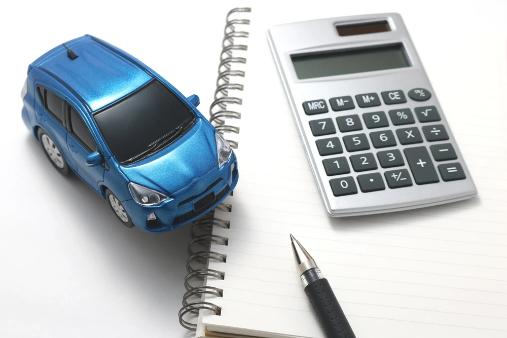 How much do you need to save before buying a new car
